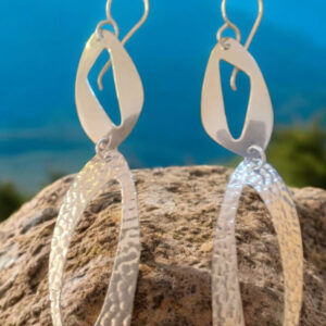 aretes fish largo en plata .925