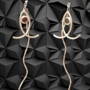 aretes fish largo en plata .925